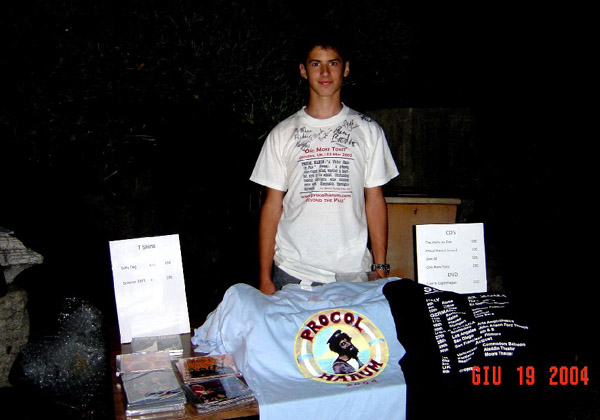 Andrea selling his merchandise